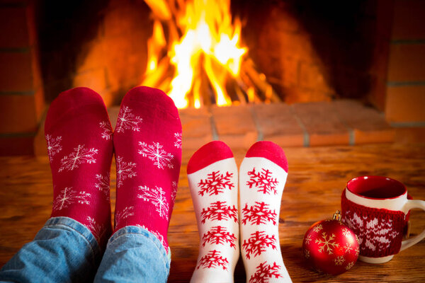 feet in warm christmas socks
