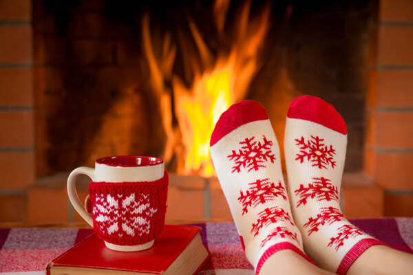feet in warm christmas socks