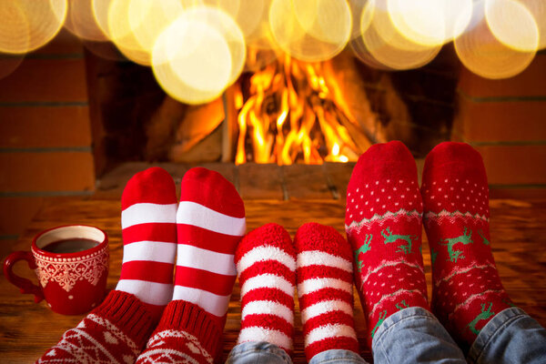 feet in warm christmas socks