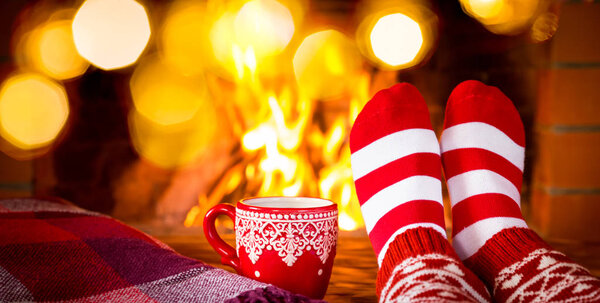 feet in warm christmas socks