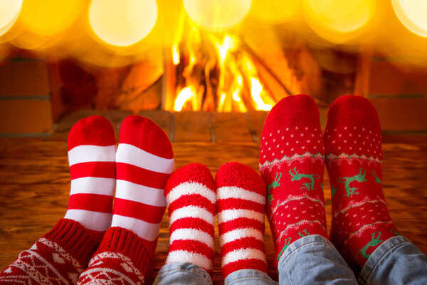 feet in warm christmas socks