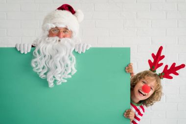 Noel Baba ve Ren geyiği çocuk