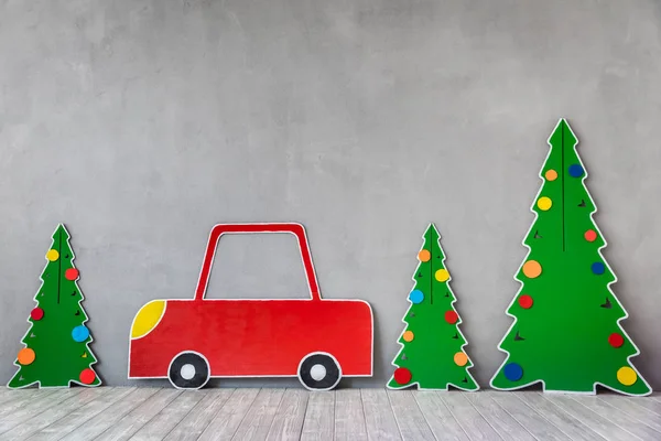 Cardboard car and Christmas tree — Stock Photo, Image