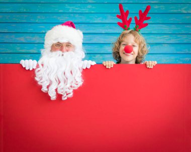 Noel Baba ve Ren geyiği çocuk