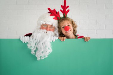 Noel Baba ve Ren geyiği çocuk