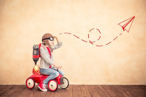 Kid with jet pack at home — Stock Photo, Image