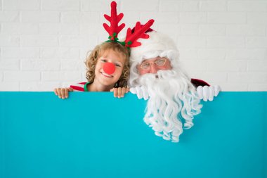 Noel Baba ve Ren geyiği çocuk