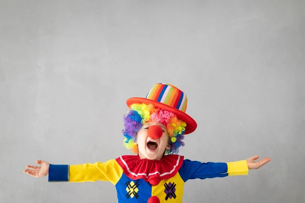 Funny kid clown playing indoor — Stock Photo, Image