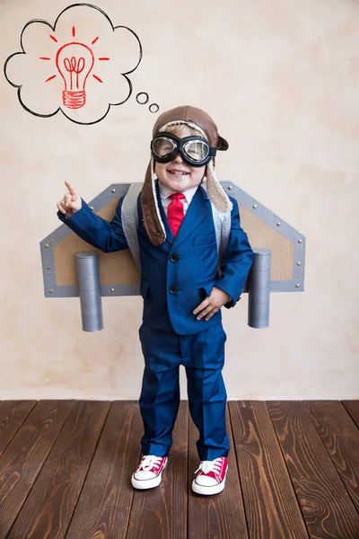 Portrait Young Businessman Toy Paper Wings Happy Child Playing Home — Stock Photo, Image