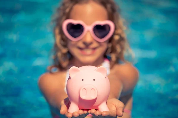 Happy Child Holding Piggybank Blue Water Background Girl Having Fun — Stock Photo, Image