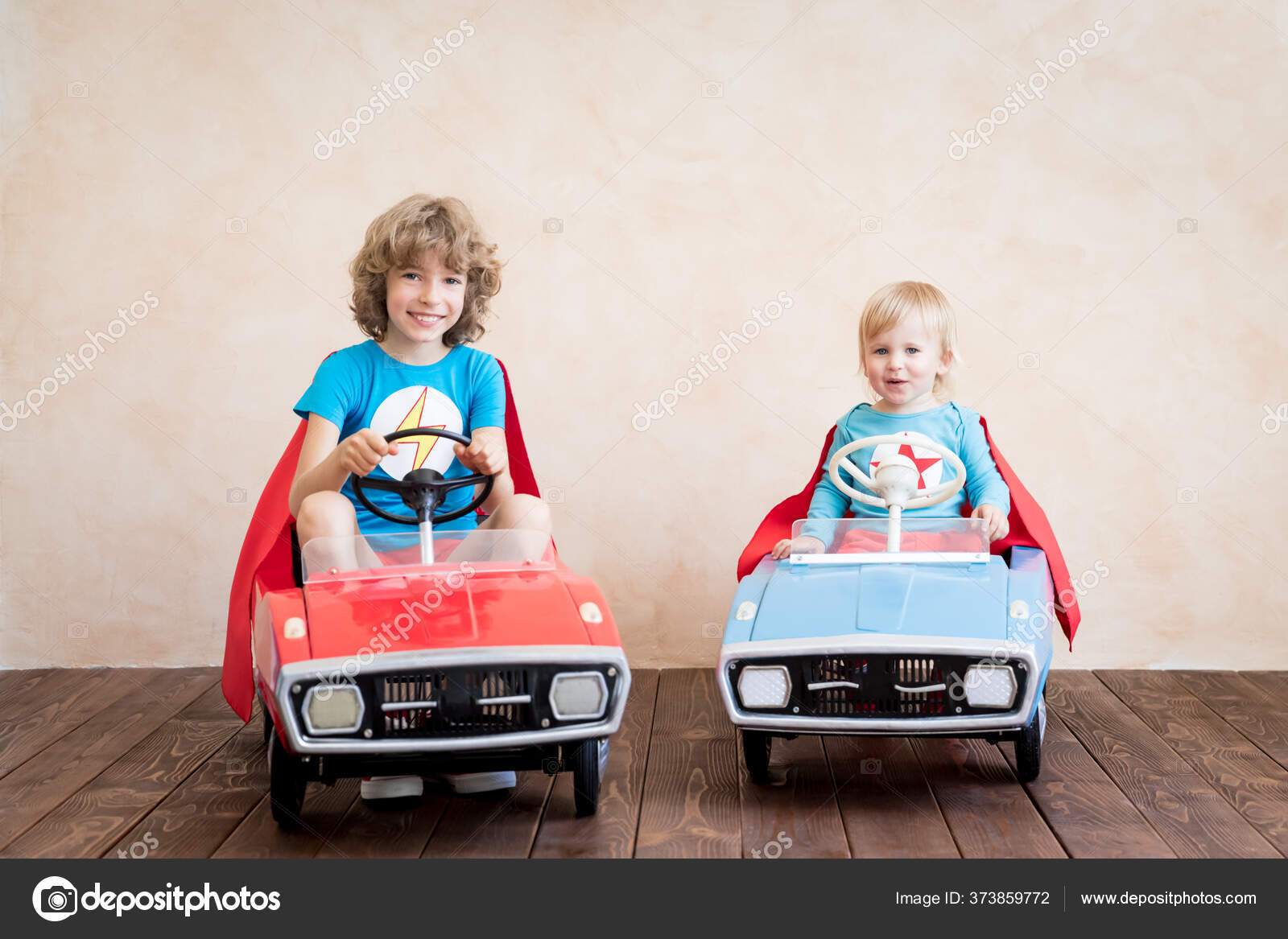 kids driving toy cars