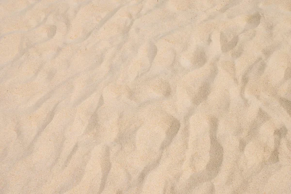 Fijn strand zand in de zomerzon — Stockfoto