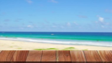 Outdoor table wood texture on beach sea background, 4K UHD. Video Clip.