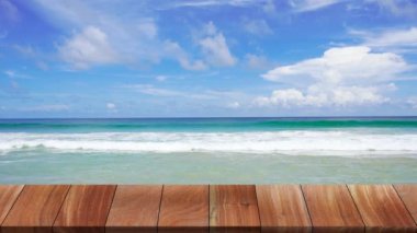 Outdoor table wood texture on beach sea background, 4K UHD. Video Clip.