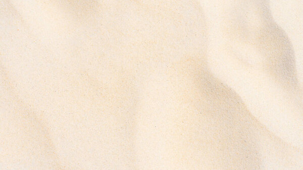 Beach sand texture, Sand dune in summer sun as background.