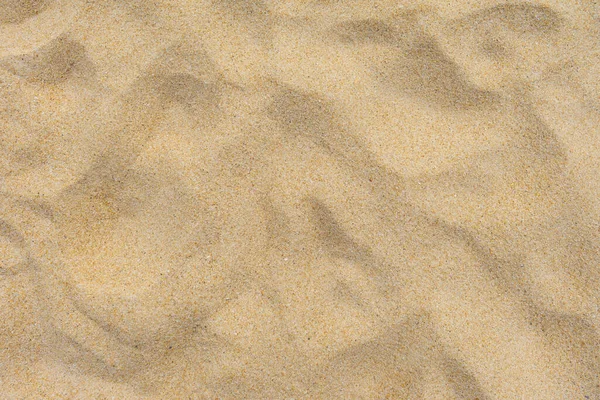 Beach sand texture, Sand dune in summer sun as background.