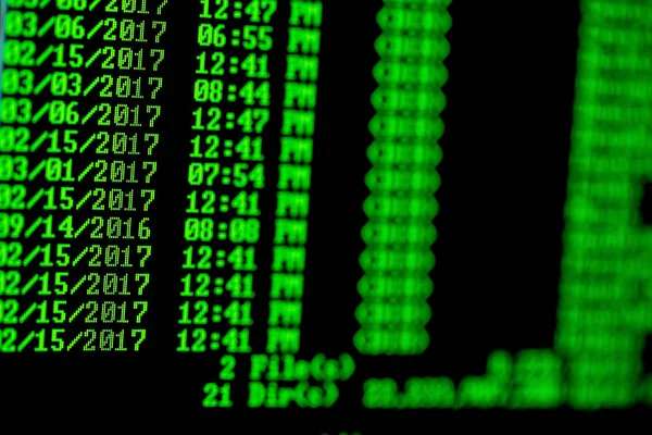Hacker-Konzept. Windows-Computer-Liste der Dateien in directory.green Text auf schwarzem Hintergrund. — Stockfoto