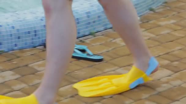 Man Walking In Flippers — Stockvideo