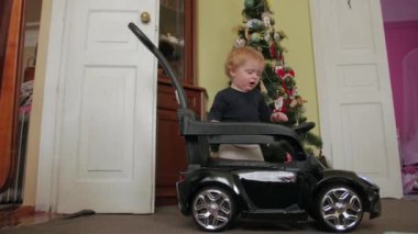 Little Boy And Electric Car