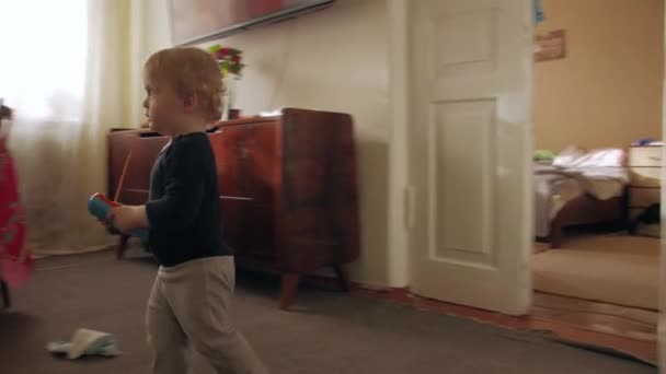 Toddler Boy Walks Around — Stockvideo