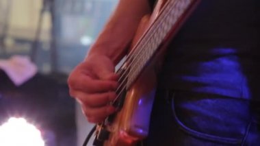 Hands Playing Bass Closeup