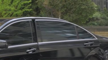 Black Car Drives Off