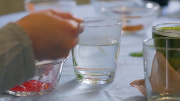 Pintura roja en agua — Vídeo de stock