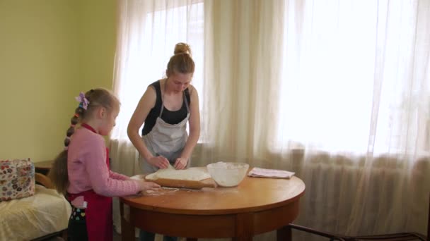 Girl With Daughter Rolling Dough — Stock Video