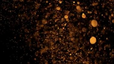 güzel animasyon çok renkli uçan titreşen parçacıkların bir siyah arka plan üzerinde dağınık