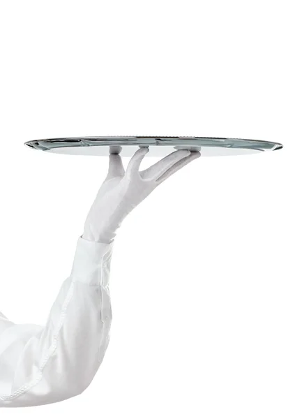 Рука офіціанта тримає срібний лоток — стокове фото
