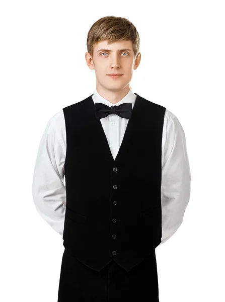 Kelner, stojąc z rękami za plecami — Zdjęcie stockowe