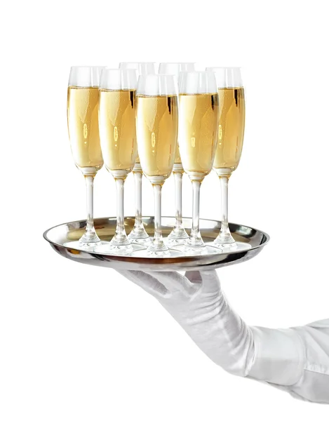 Ober serveren champagne op dienblad — Stockfoto