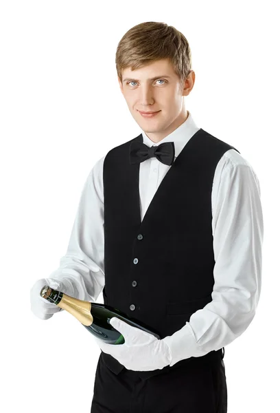 Servitören öppning flaska champagne — Stockfoto