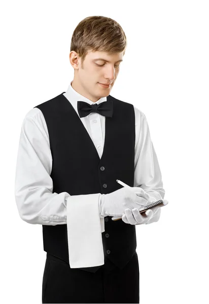 Młody przystojny kelner biorąc zamówienia — Zdjęcie stockowe