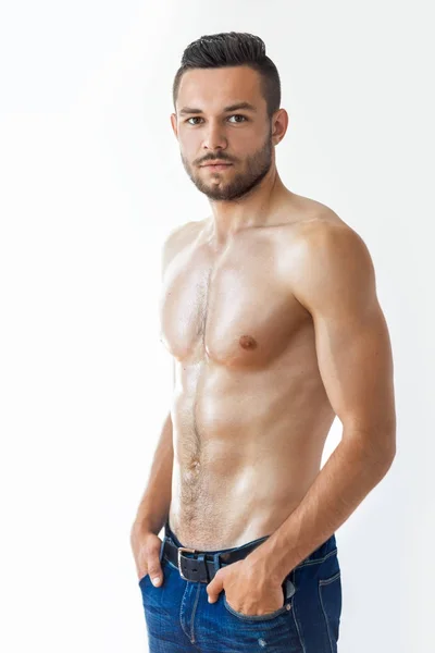 Muscular shirtless man in jeans — Stock Photo, Image