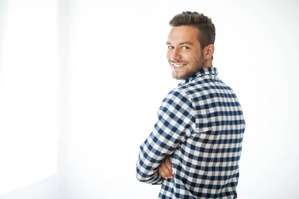 Smiling handsome man with crossed arms — Stock Photo, Image