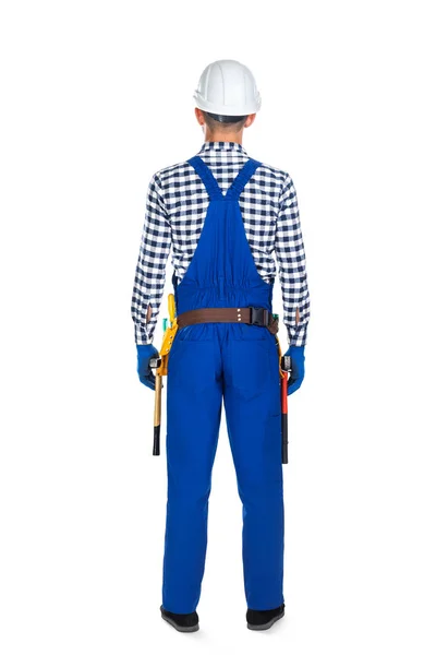 Stavební dělník v uniformě a nástroj pás — Stock fotografie