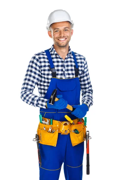 Feliz trabalhador da construção sorridente com martelo — Fotografia de Stock