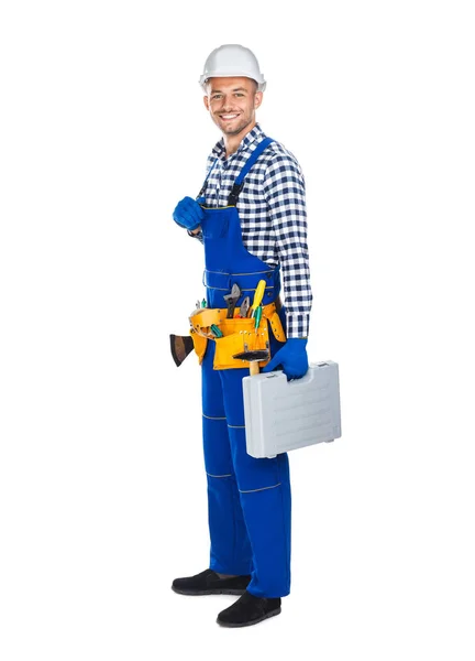 Construction worker in uniform with toolbox — Stock Photo, Image