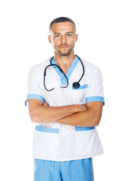 Allvarliga säker läkare med armarna korsade — Stockfoto
