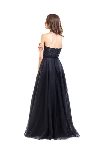 Back view of young beautiful woman in black evening dress — Stock Photo, Image