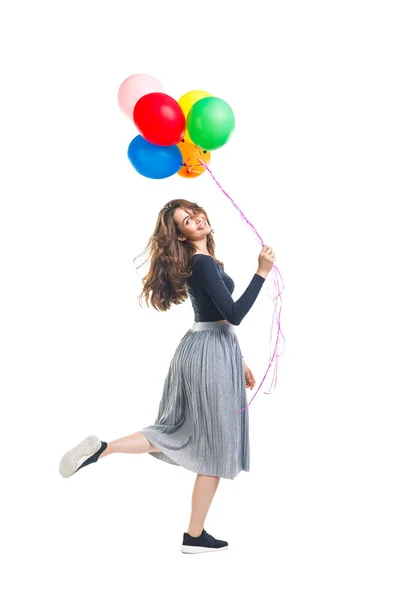 Happy beautiful woman holding colorful balloons — Stock Photo, Image