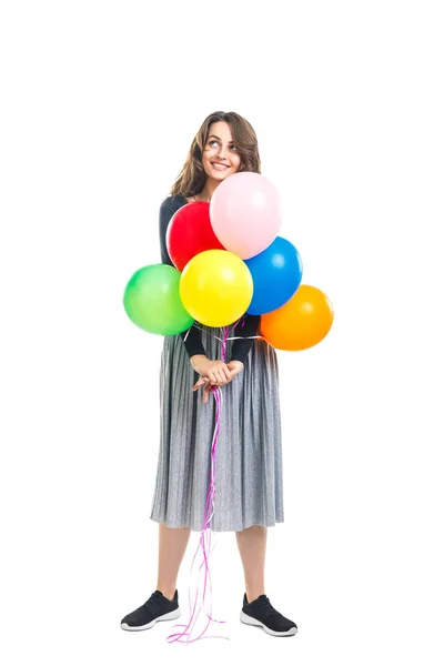 Happy beautiful woman holding colorful balloons — Stock Photo, Image