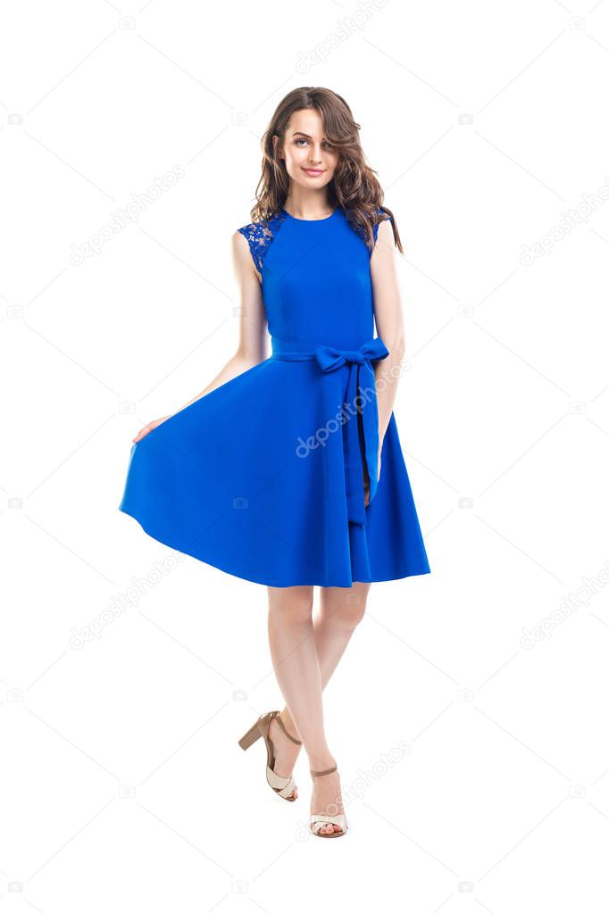 Happy beautiful woman in blue dress