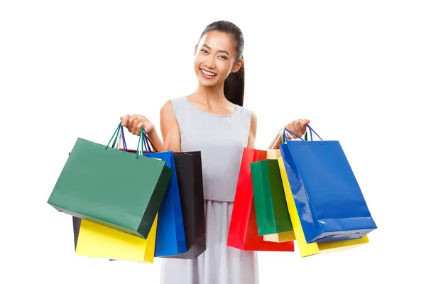 Mujer sosteniendo bolsas de compras —  Fotos de Stock