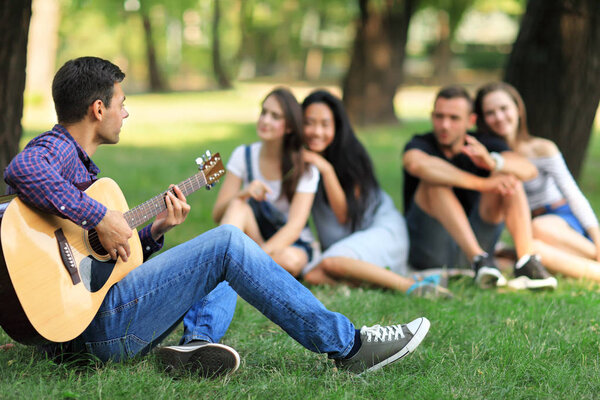 Man singing song with guitar 