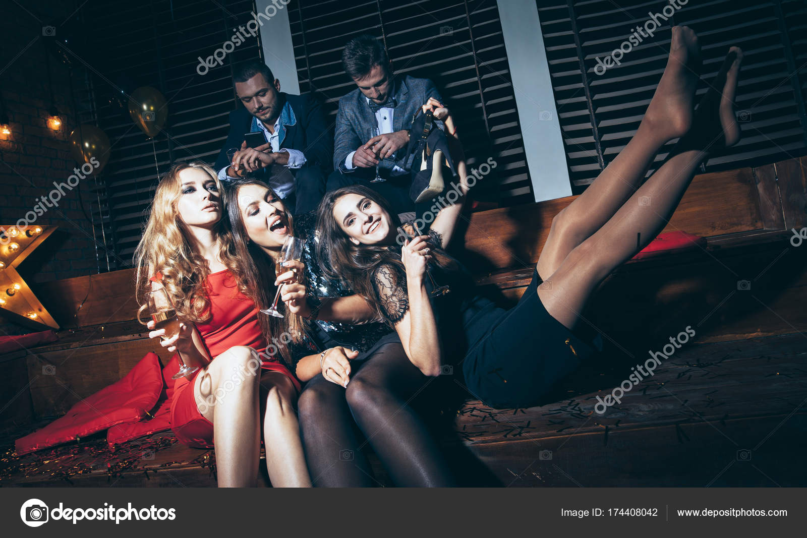 Women at night club Stock Photo by ©Gladkov 174408042