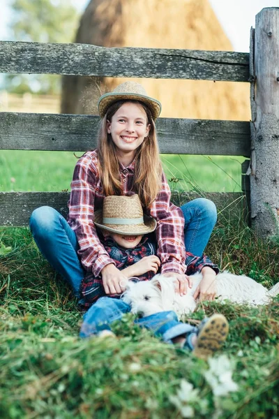 Sister Hugging Brother Sitting Dog Wooden Fence Haystack Happy Childhood — Stock Photo, Image