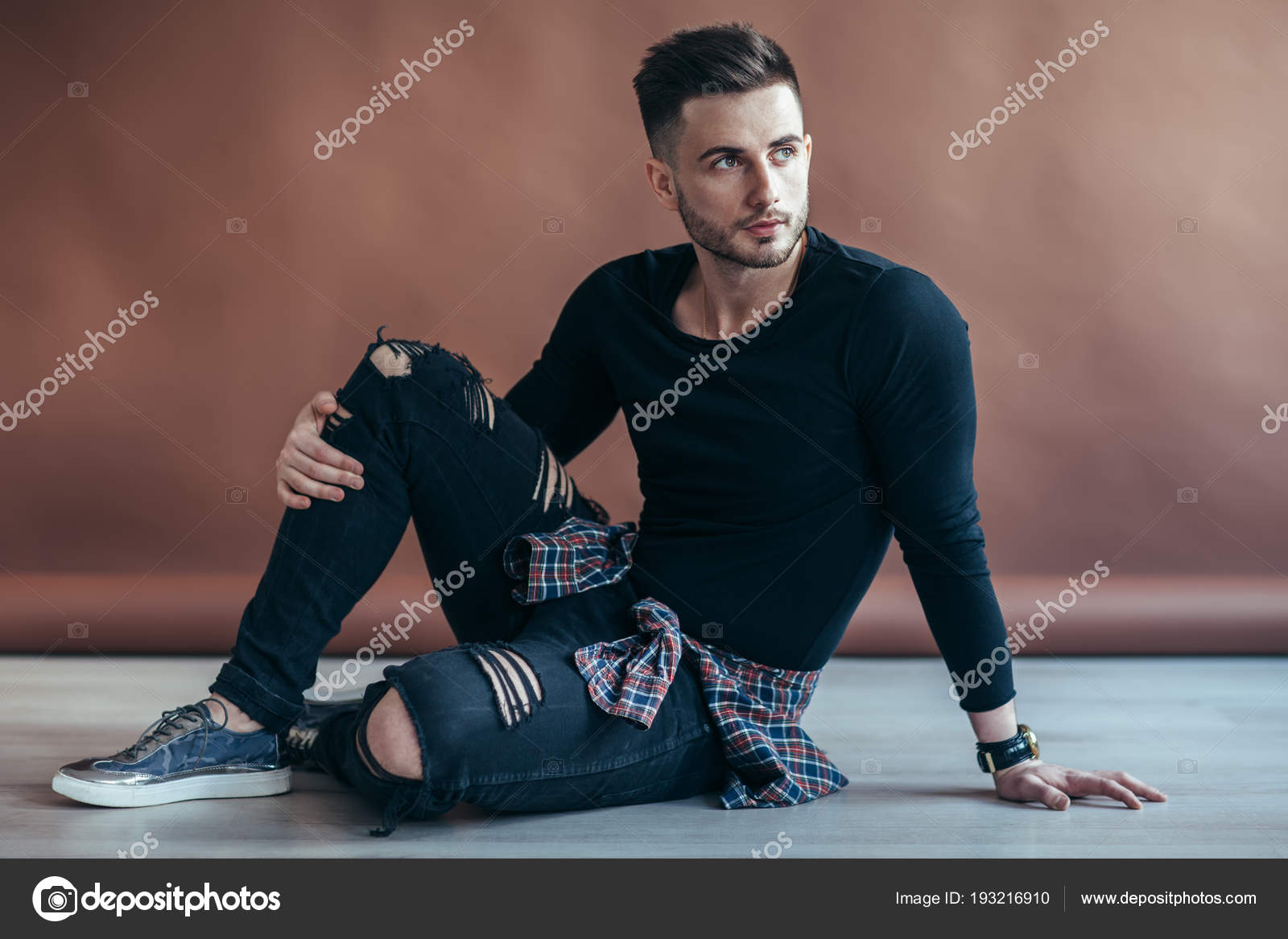 Male Model Posing In Studio While Arranging His Jacket Stock Photo -  Download Image Now - iStock
