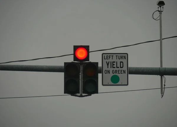 Traffic sign with the Stop light on